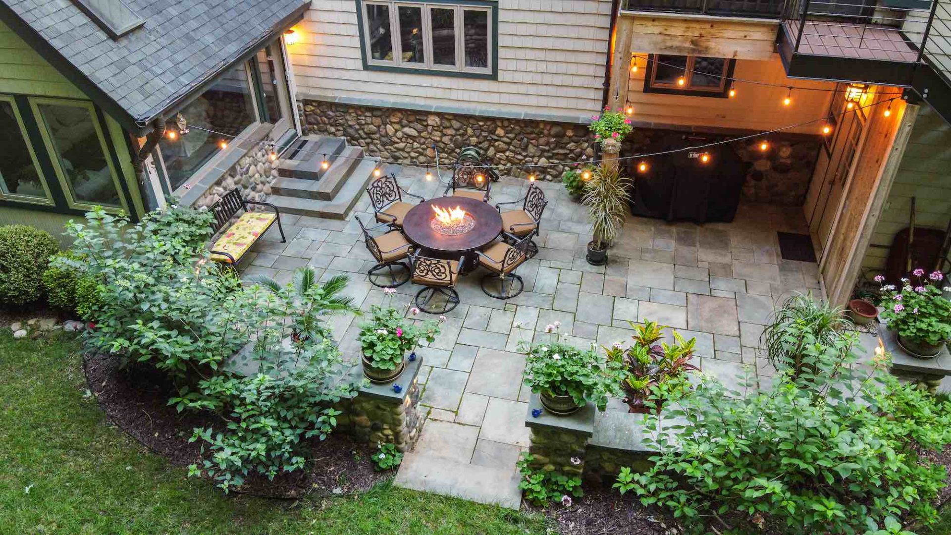 Aging Composite Deck Transformed into an Enchanting Woodland Patio